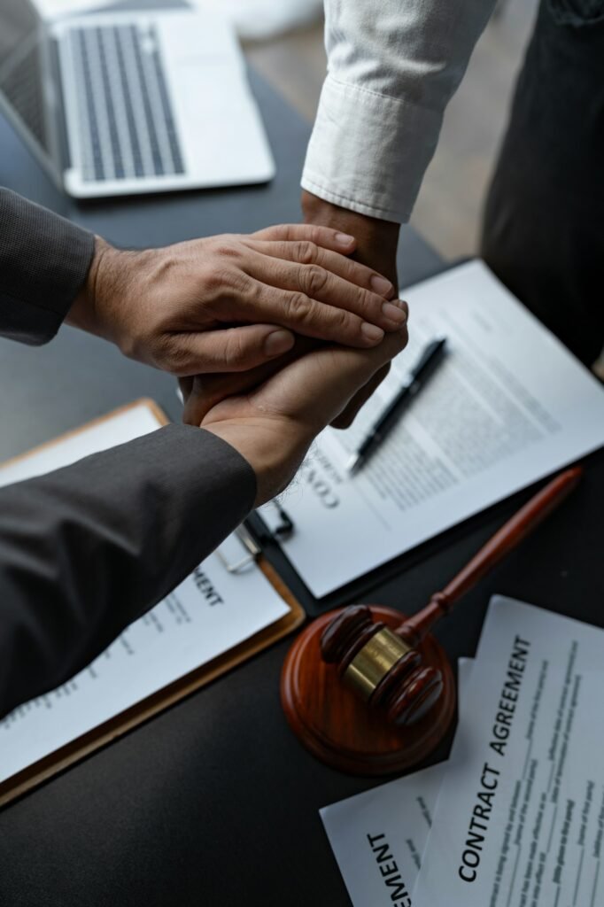 The handshake after a good cooperation, consulting between attorney and client, businessman, tax and